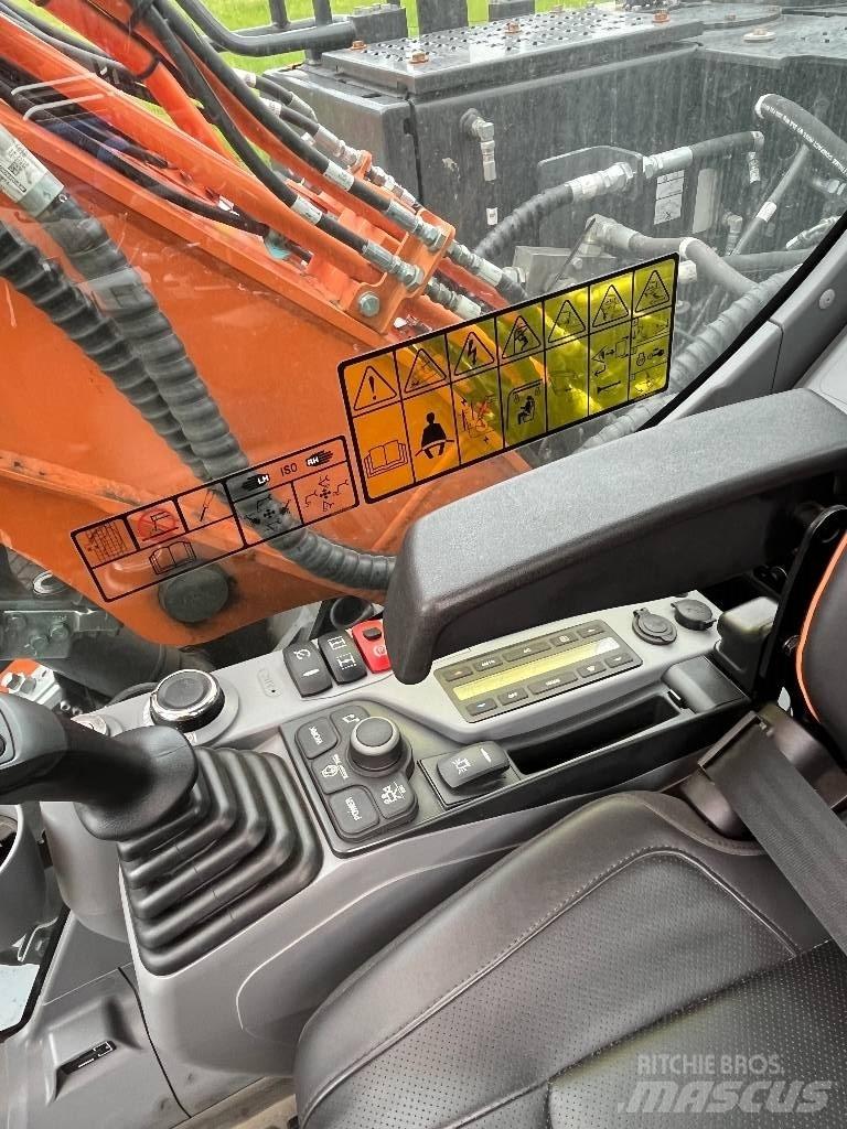 Develon DX140W-7 Колёсные экскаваторы