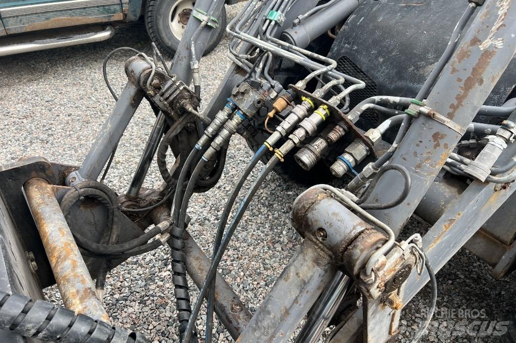 LM Trac 586 Универсальные фронтальные погрузчики