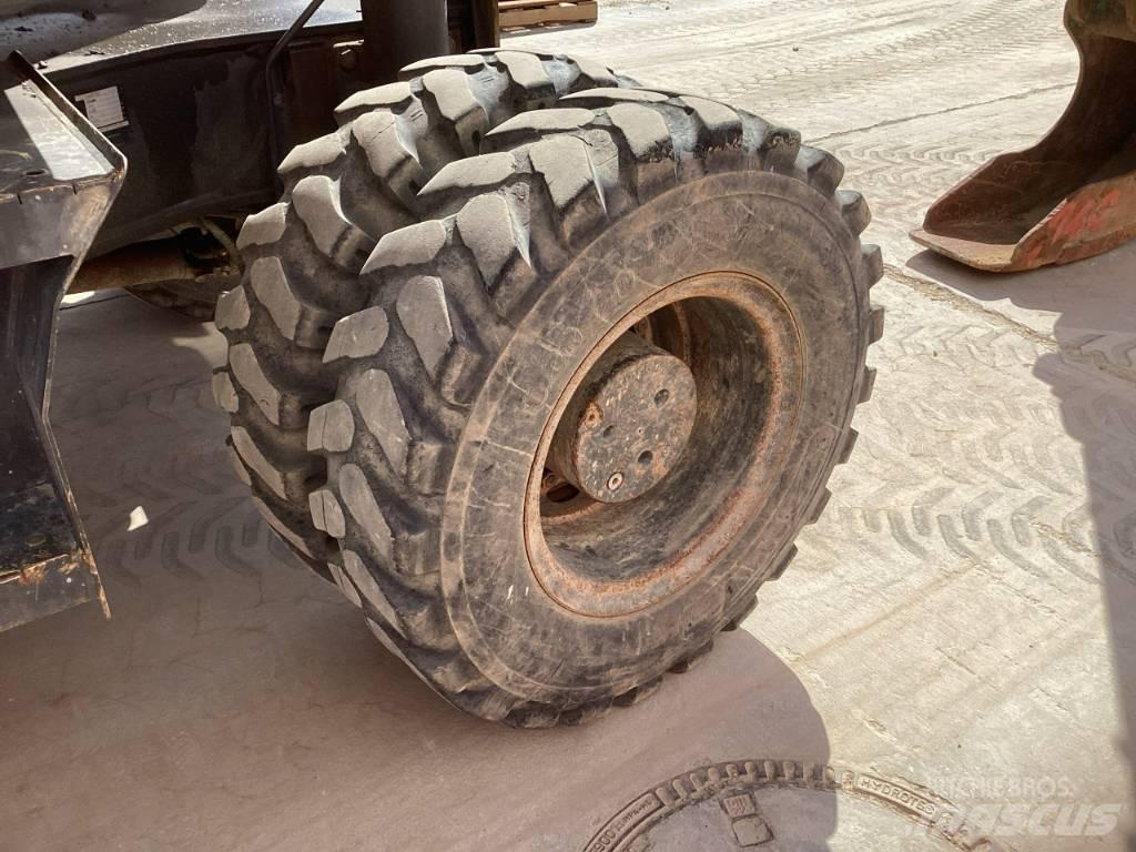 Komatsu PW 160-7E0 Колёсные экскаваторы