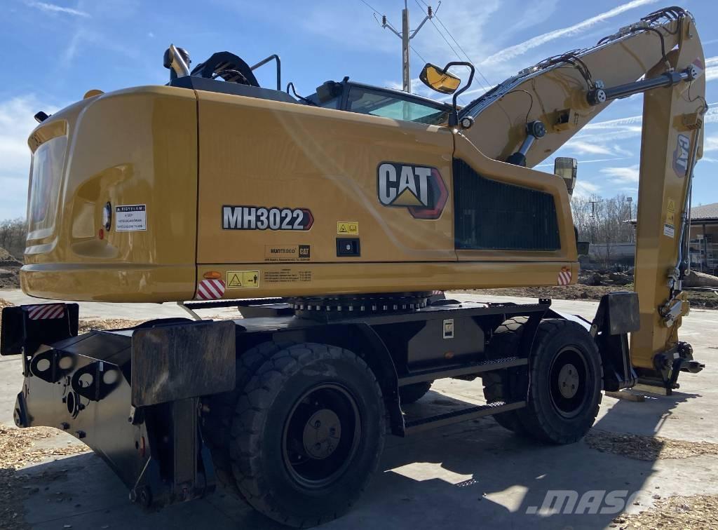 CAT MH 3022 Колёсные экскаваторы