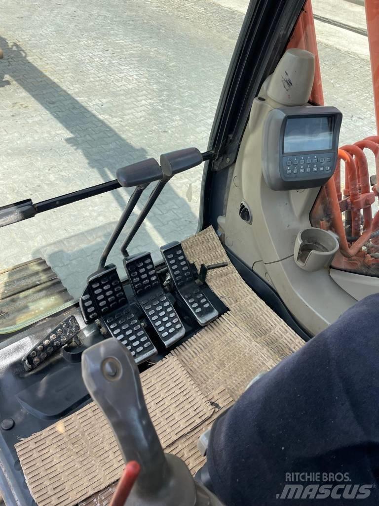 Hitachi ZX 180 Гусеничные экскаваторы