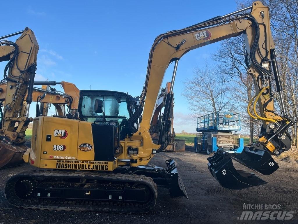 CAT 308 Малые экскаваторы 7т-12т