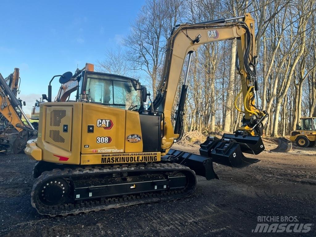CAT 308 Малые экскаваторы 7т-12т