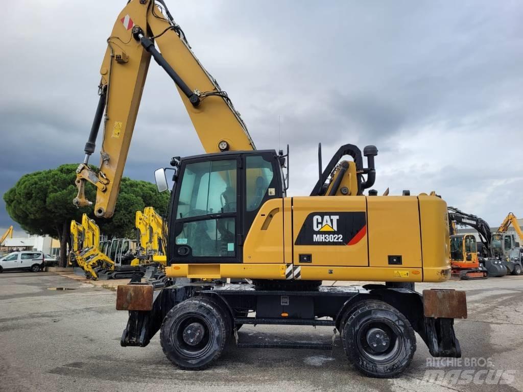 CAT mh3022 Колёсные экскаваторы