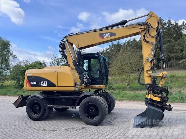 CAT M 315 D Колёсные экскаваторы