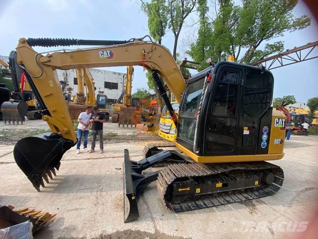 CAT 307 E Малые экскаваторы 7т-12т