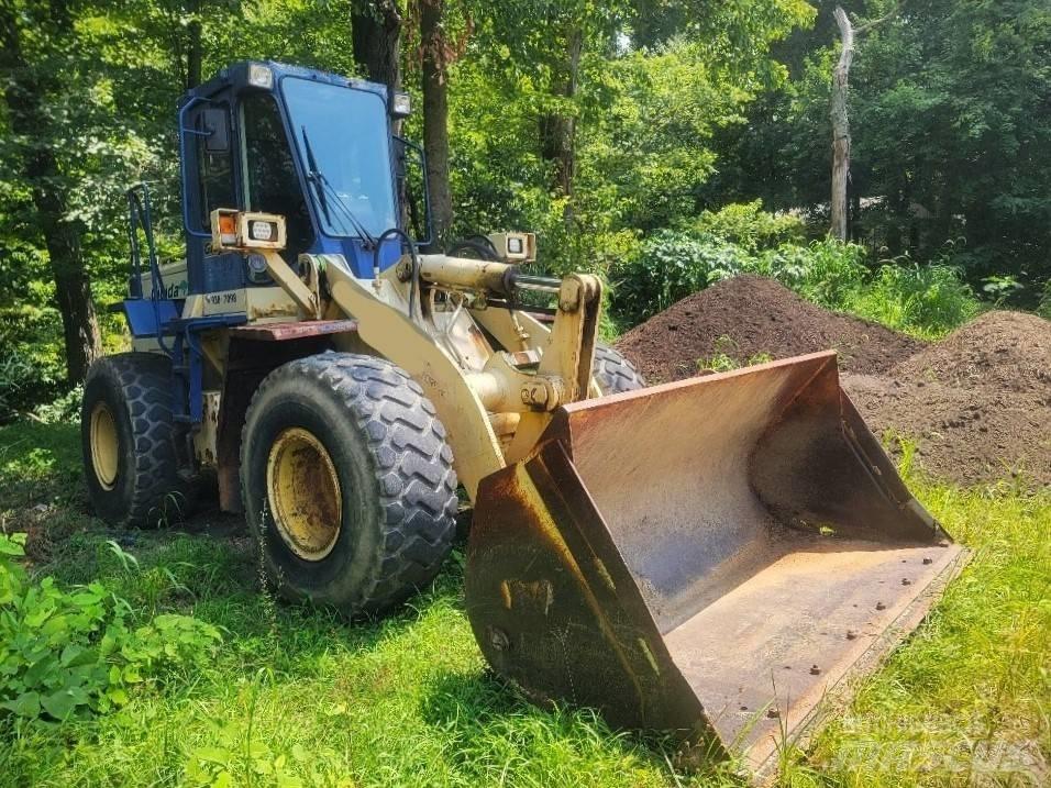 Komatsu WA 250 Фронтальные погрузчики