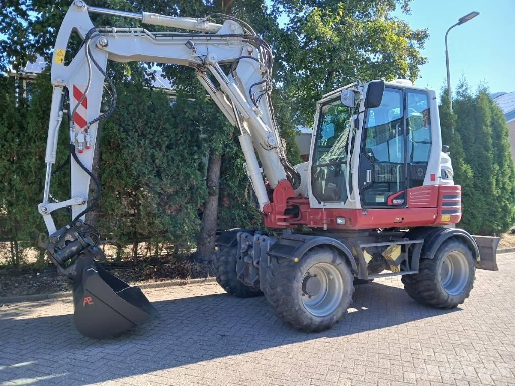 Takeuchi TB 295 W Колёсные экскаваторы