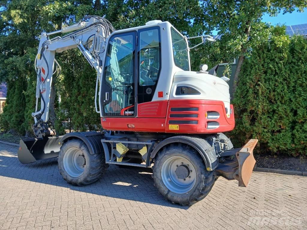 Takeuchi TB 295 W Колёсные экскаваторы