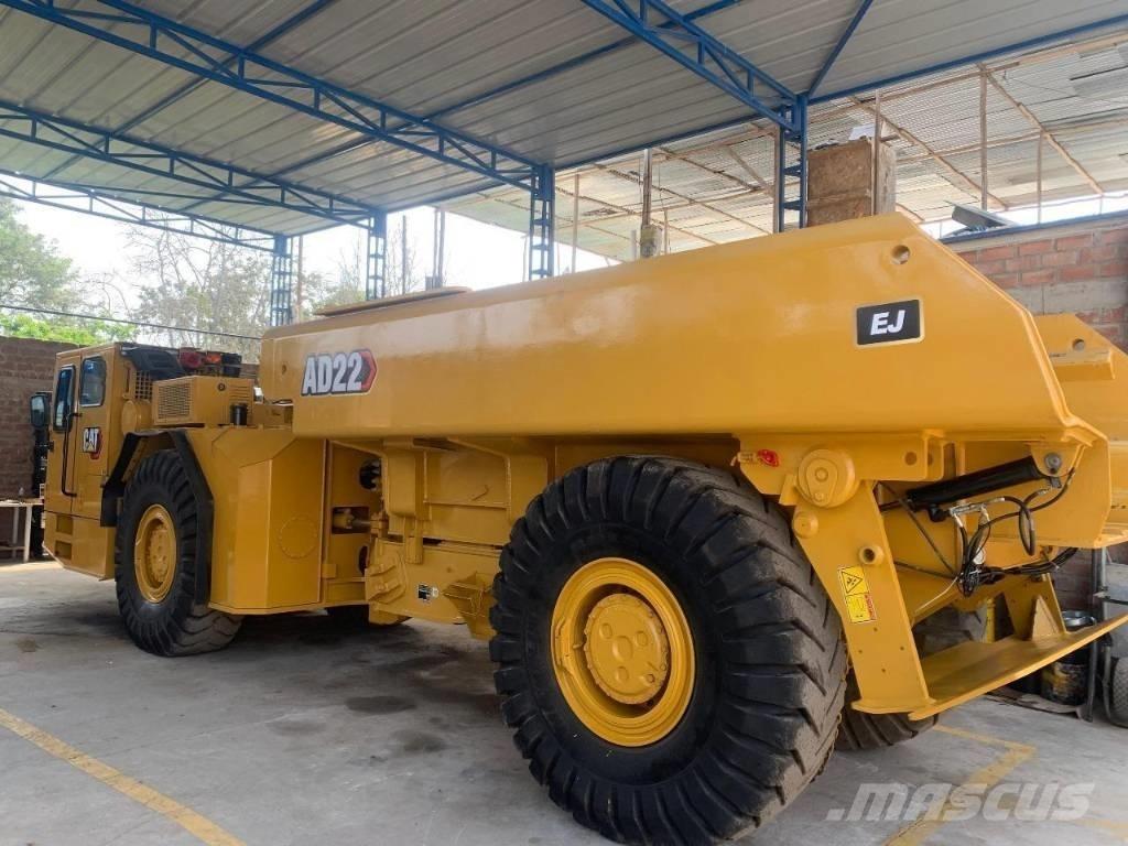 CAT AD 22 Грузовики-Самосвалы
