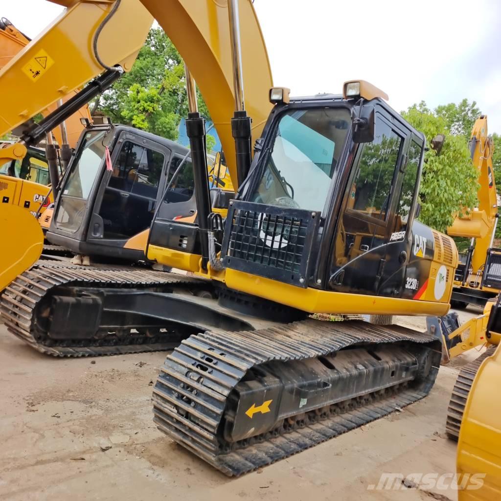 CAT 323 D Гусеничные экскаваторы