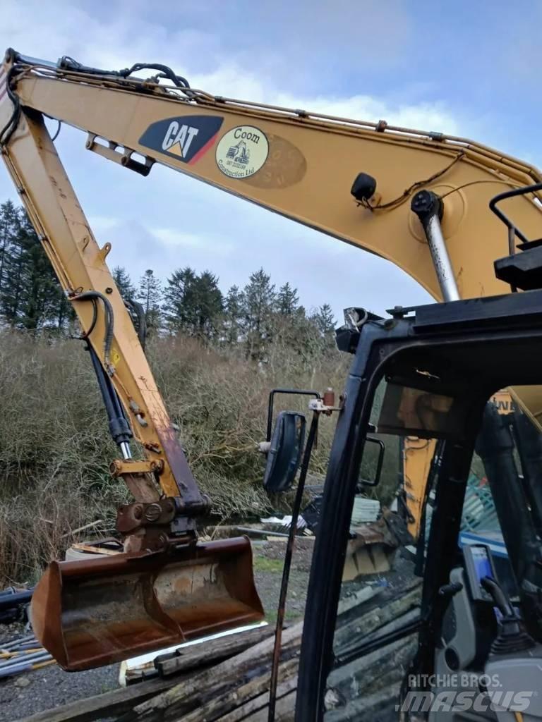 CAT 320 E Экскаваторы с большим вылетом