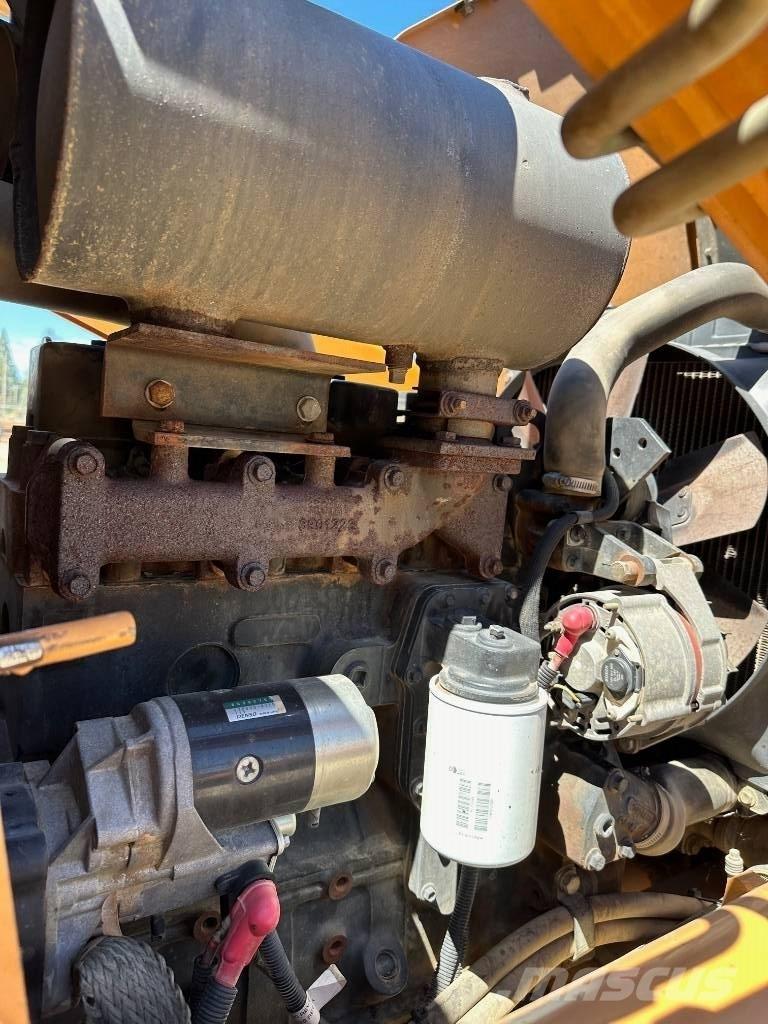 CASE 570 M XT Фронтальные погрузчики