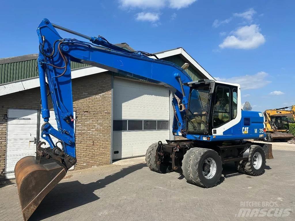CAT M315 Колёсные экскаваторы