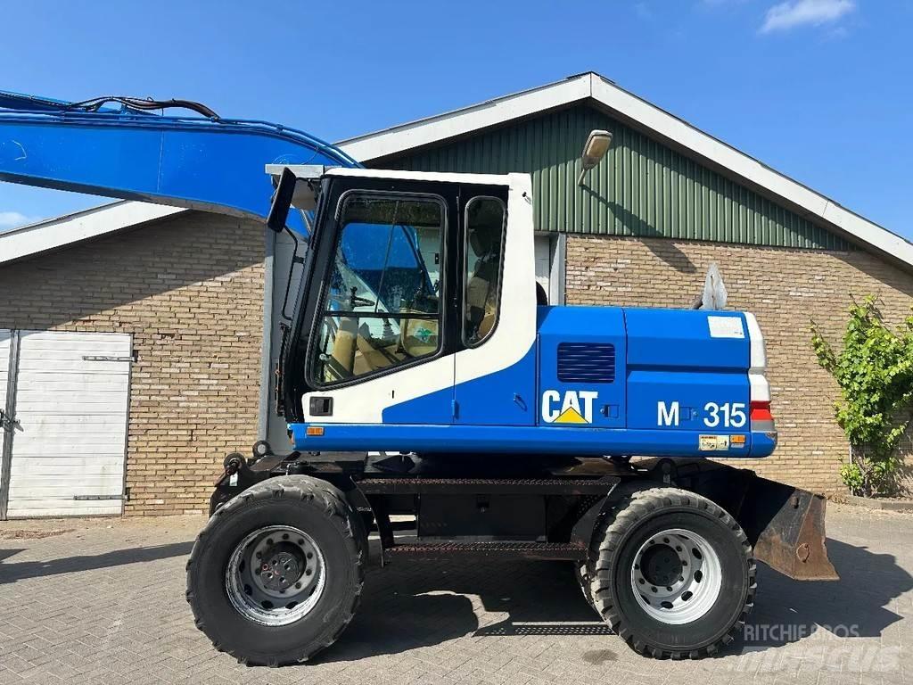 CAT M315 Колёсные экскаваторы