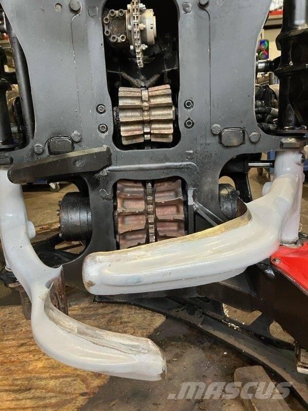 Komatsu C 124 Харвестеры