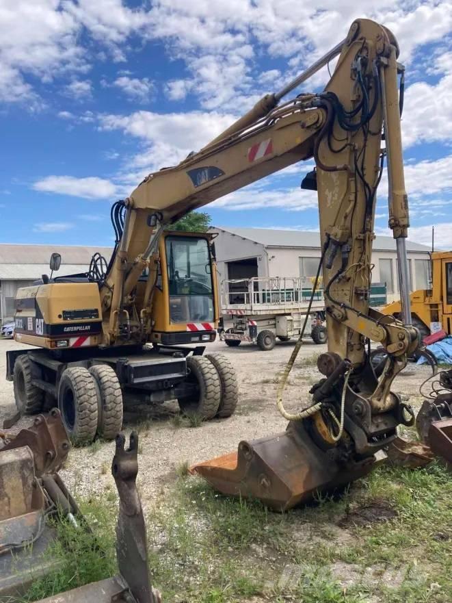 CAT M 312 Колёсные экскаваторы