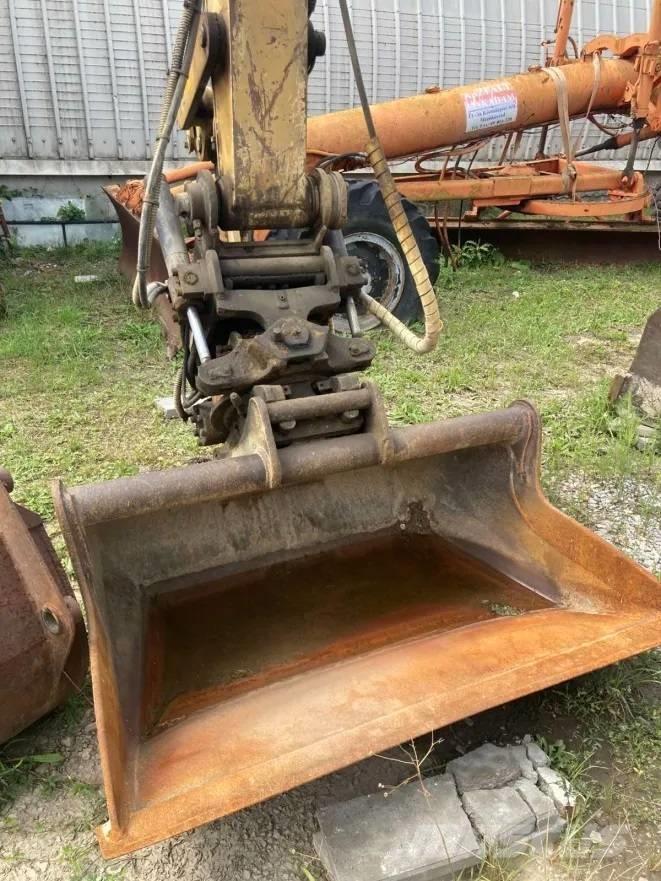 CAT M 312 Колёсные экскаваторы