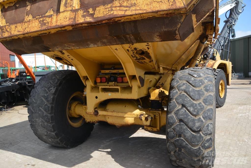 CAT 735 Шарнирно-сочленённые самосвалы