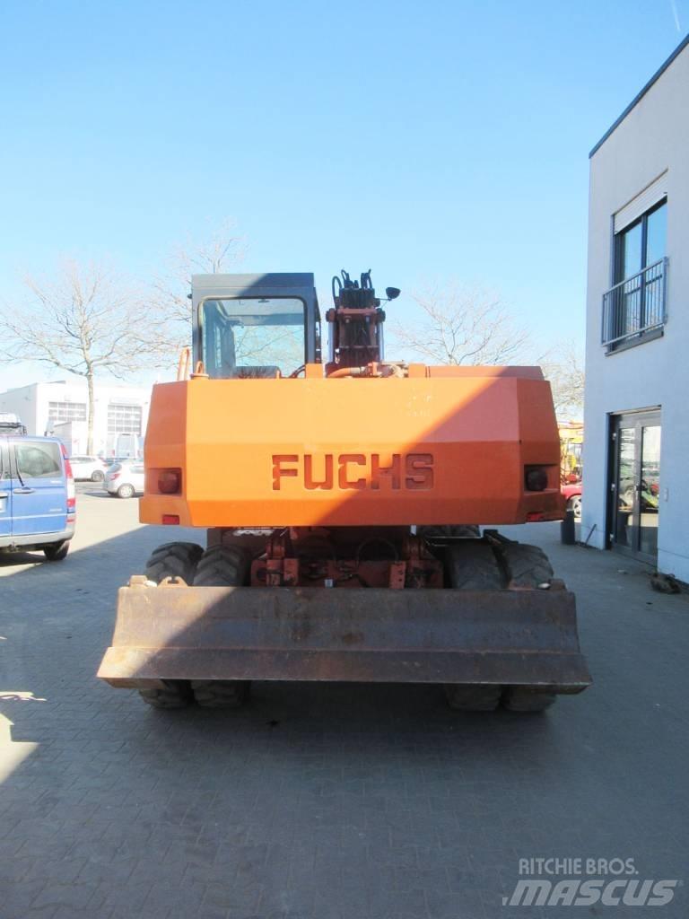 Fuchs 712M Колёсные экскаваторы