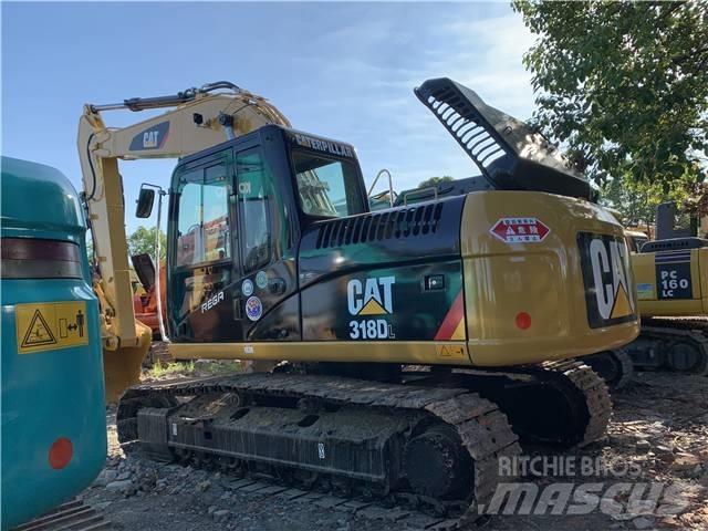CAT 318DL Гусеничные экскаваторы