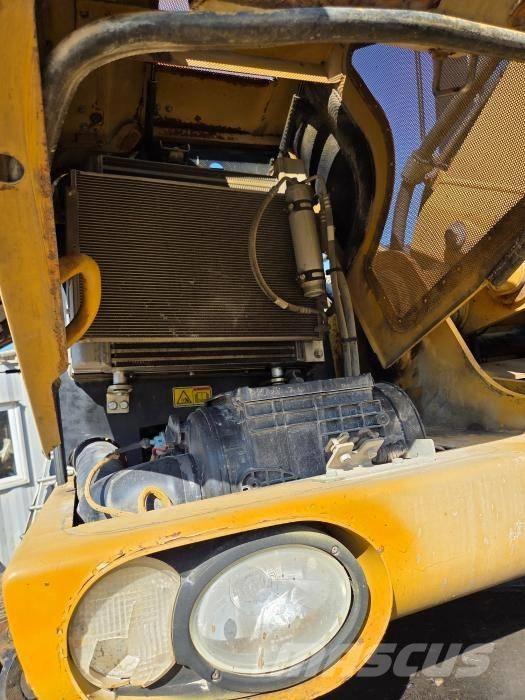 CAT M 313 D Колёсные экскаваторы