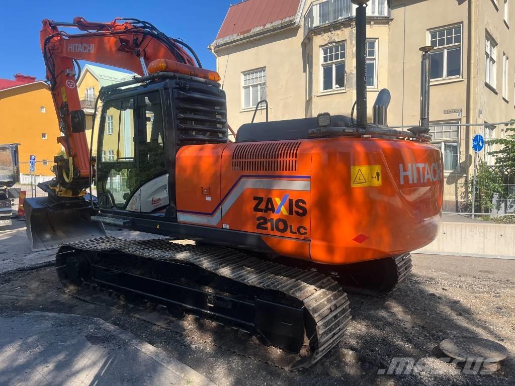 Hitachi ZX 210 Гусеничные экскаваторы