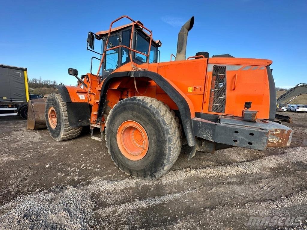 Doosan DX420-3 Колёсные экскаваторы