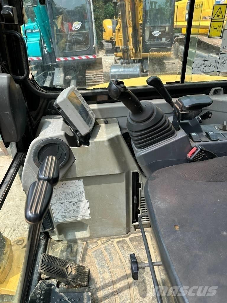 CAT 303.5E2 Мини-экскаваторы