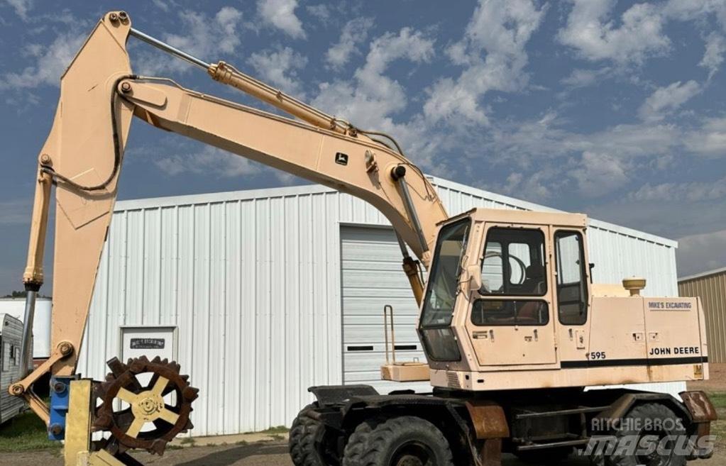 John Deere 595 Колёсные экскаваторы