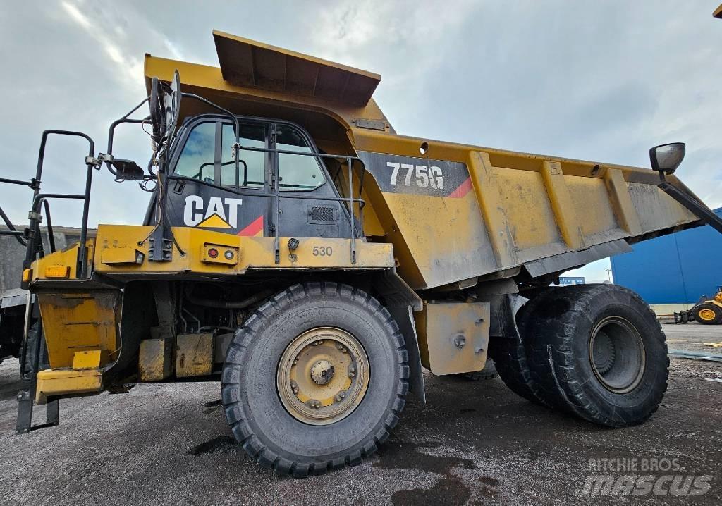 CAT 775 G Шарнирно-сочленённые самосвалы