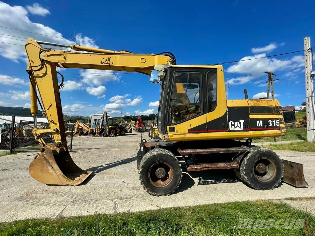 CAT M 315 Колёсные экскаваторы