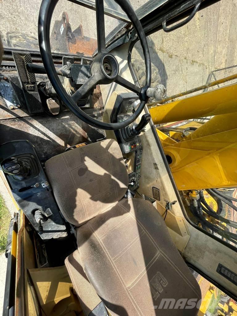 CAT M 315 Колёсные экскаваторы