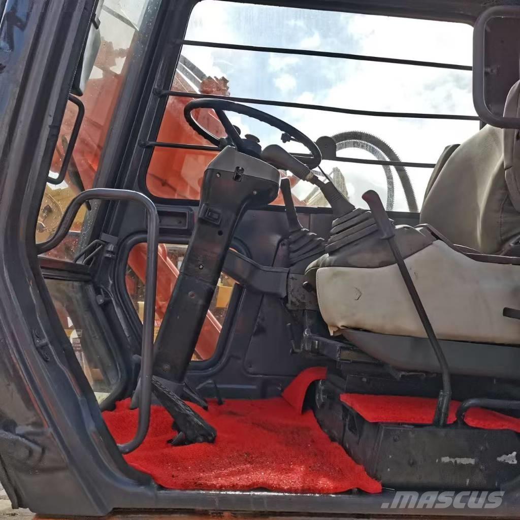 Hitachi EX 100 W D Колёсные экскаваторы