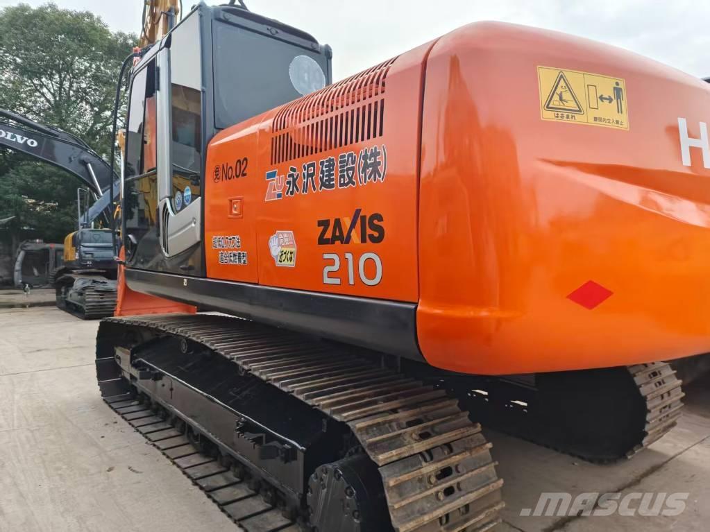 Hitachi ZX 210 Гусеничные экскаваторы