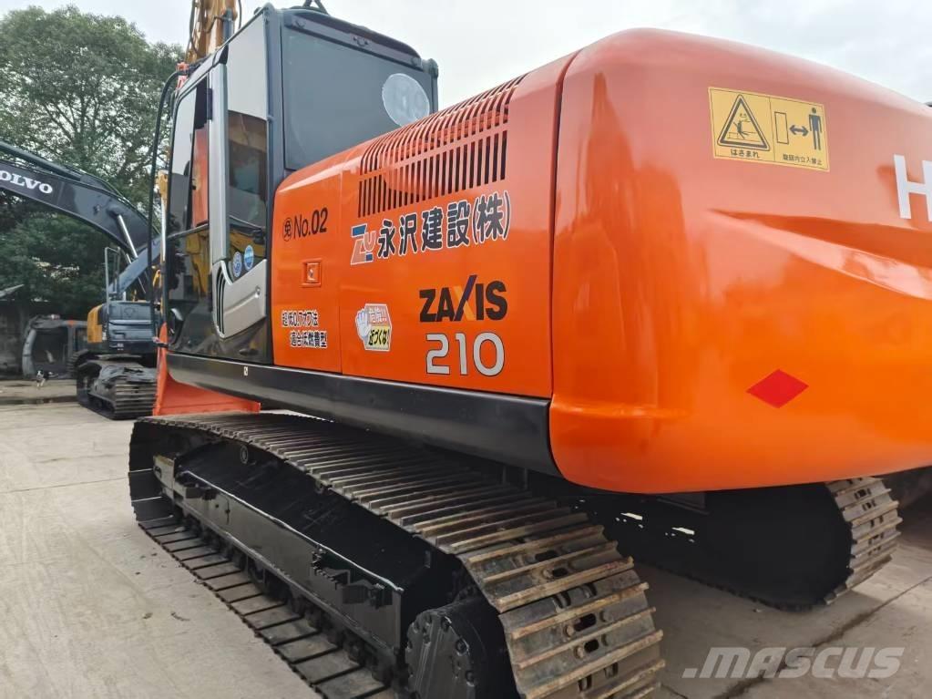 Hitachi ZX 210 Гусеничные экскаваторы