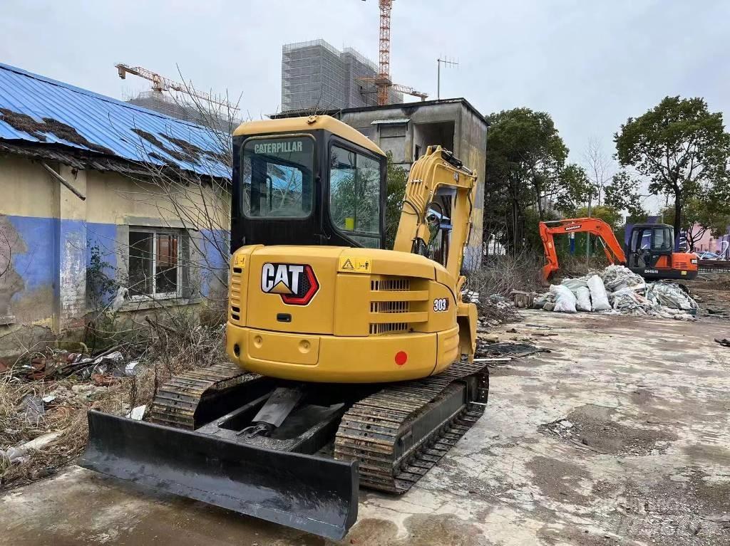 CAT 303c Мини-экскаваторы