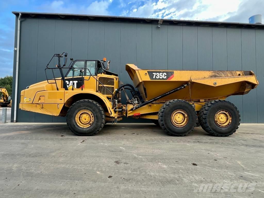 CAT 735C Шарнирно-сочленённые самосвалы