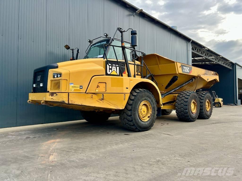CAT 735C Шарнирно-сочленённые самосвалы