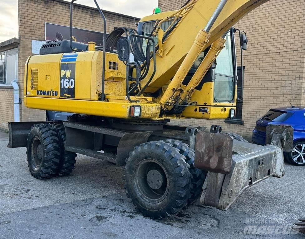 Komatsu PW 160-7 Колёсные экскаваторы