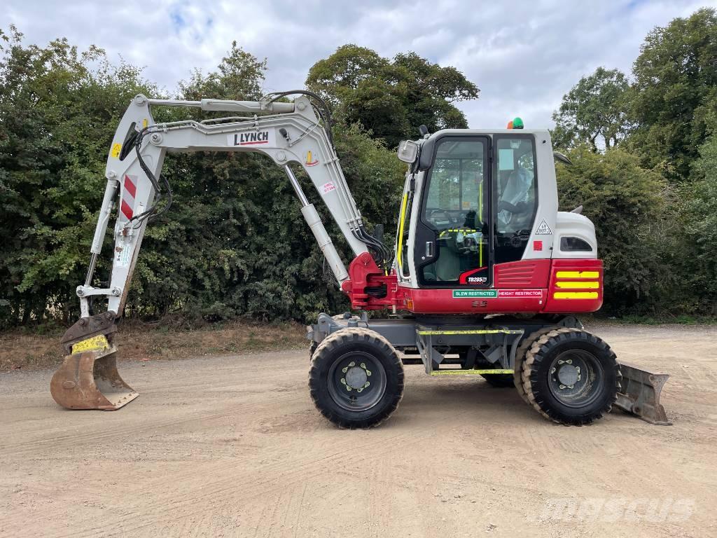 Takeuchi TB 295 W Колёсные экскаваторы