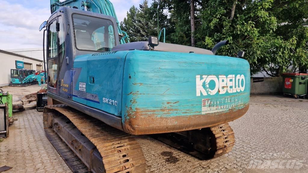 Kobelco SK210 Гусеничные экскаваторы