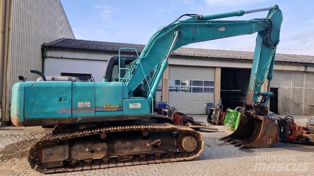 Kobelco SK210 Гусеничные экскаваторы