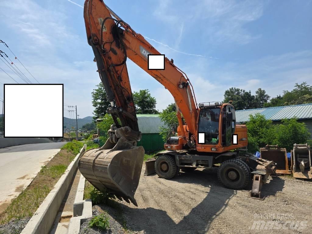 Doosan DX 210 W Колёсные экскаваторы