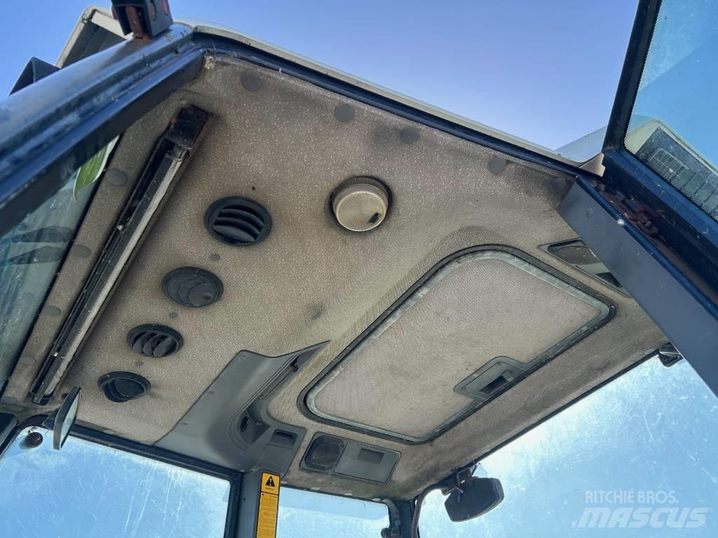New Holland 7740 Трактора
