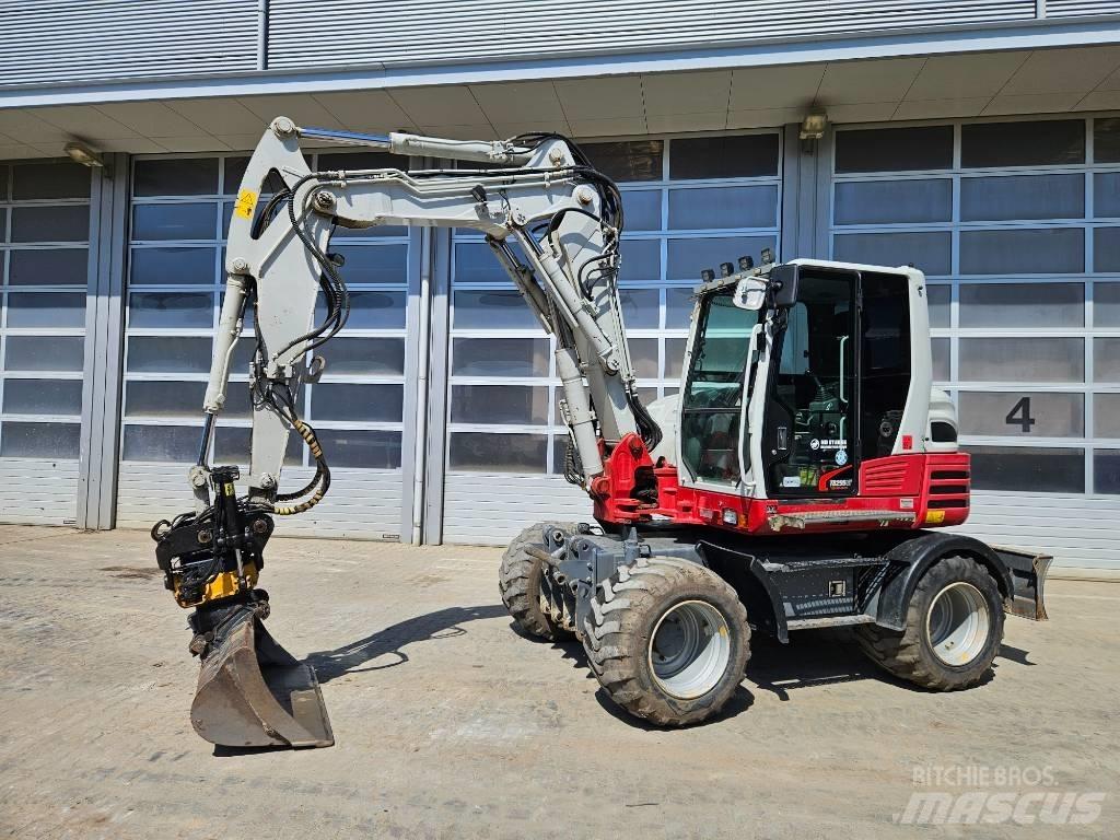 Takeuchi TB295W Колёсные экскаваторы