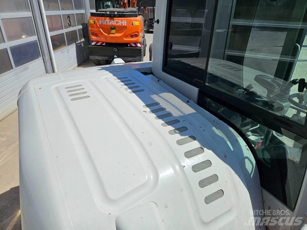 Takeuchi TB295W Колёсные экскаваторы