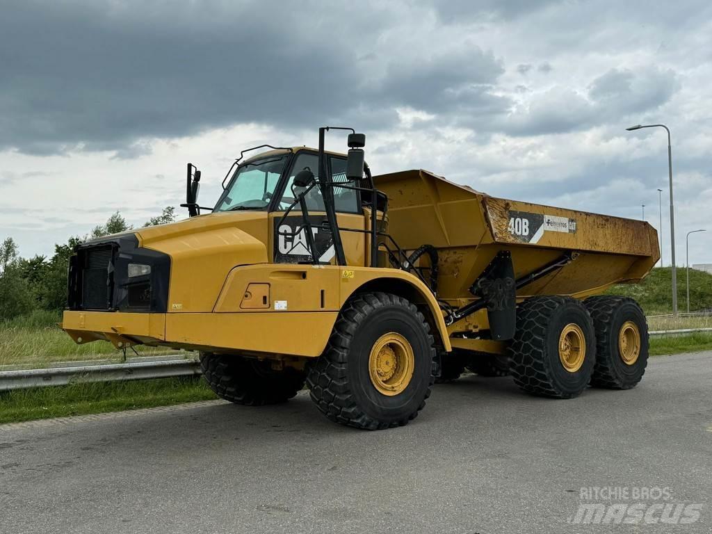 CAT 740B Шарнирно-сочленённые самосвалы