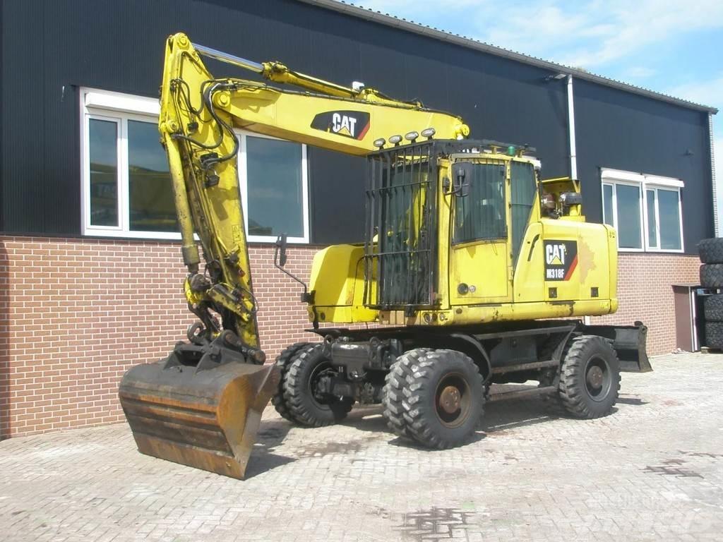 CAT M318F Колёсные экскаваторы