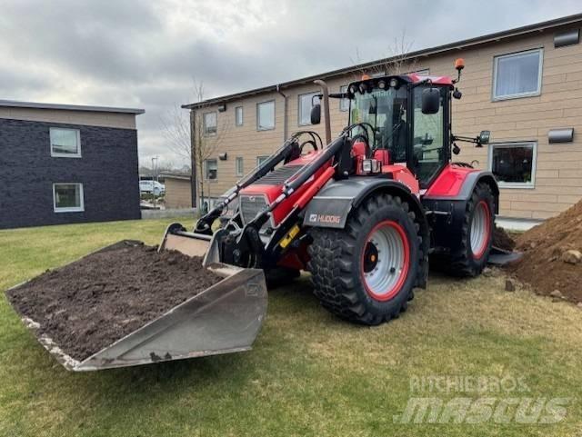 Huddig 1260 C Экскаваторы-погрузчики
